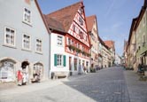 Shops And Cafes On Obere Schmiedgasse, Rothenburg Ob Der Tauber, Franconia, Bavaria, Germany
