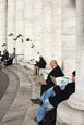 Thumbnail image of St Peters - people relaxing on the Colonnade, Rome, Italy