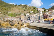 Tourists Gathered Around The Port Area In Vernazza, Cinque Terre, Liguria, Italy