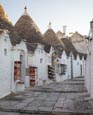Thumbnail image of Typical trullis with shops in Alberobello, Puglia, Italy