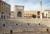 Roman Amphitheatre With The Sedile And Sant Oronzo Column, Lecce, Puglia, Italy