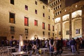 Crowds Watch An Evening Concert In The Plaça Del Rei, Barcelona, Catalonia, Spain